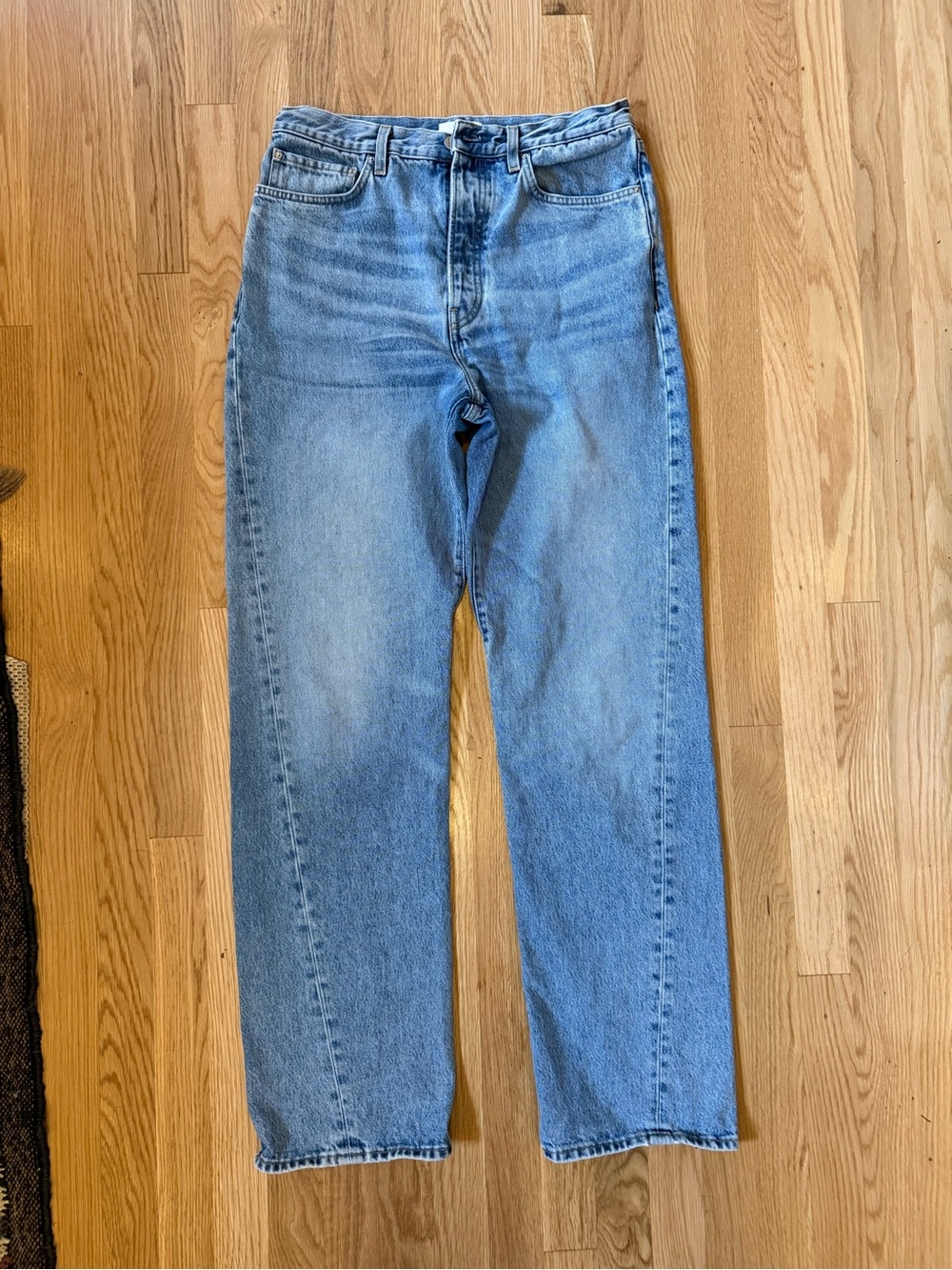 Toteme Twisted Seam Denim Full Length Jeans in Light Blue Wash